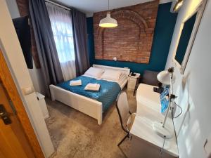 Posteľ alebo postele v izbe v ubytovaní Hotel Staropolska