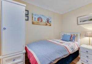 Postel nebo postele na pokoji v ubytování Bwthyn Benllech