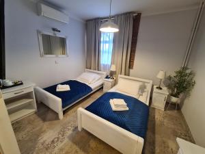 Posteľ alebo postele v izbe v ubytovaní Hotel Staropolska