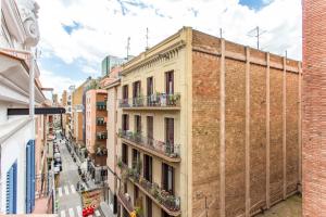 a view of a city street with buildings at Sweet Inn - Charming in Sant Gervasi in Barcelona