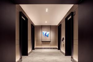 a hallway in a building with a sign on the wall at The Ritz-Carlton, Mexico City in Mexico City