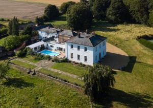 an aerial view of a large white house with a pool at Vere Lodge Garden Wing 