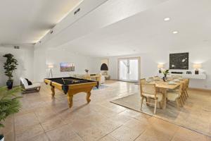 a large living room with a pool table in it at A WFH Resort in Paradise Valley in Scottsdale