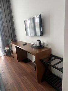 TV o dispositivi per l'intrattenimento presso Hotel Homey Kobuleti