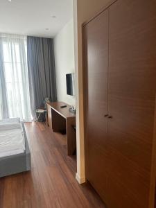 Letto o letti in una camera di Hotel Homey Kobuleti