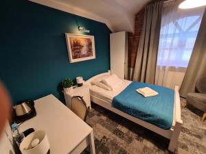 Posteľ alebo postele v izbe v ubytovaní Hotel Staropolska