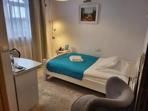 Posteľ alebo postele v izbe v ubytovaní Hotel Staropolska