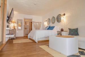 Postel nebo postele na pokoji v ubytování Bora Bora Beach Club & Hotel