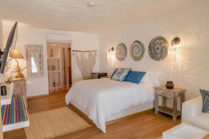 Postel nebo postele na pokoji v ubytování Bora Bora Beach Club & Hotel