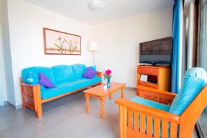 TV a/nebo společenská místnost v ubytování Apartamento en Las Flores I