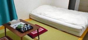 Postel nebo postele na pokoji v ubytování Hostel Belle Via Tokyo