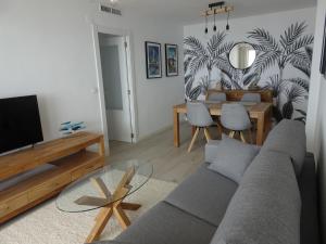 Televízia a/alebo spoločenská miestnosť v ubytovaní Primera linea - Descanso Sol y Mar