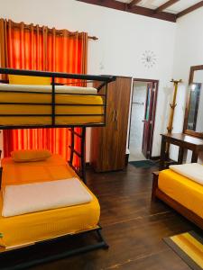 Postel nebo postele na pokoji v ubytování Uva Escape Holiday Bungalow