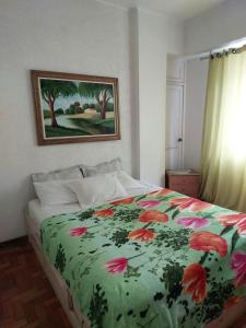 Cama o camas de una habitación en Apartamento Copacabana vista lateral mar