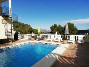 Bazén v ubytovaní Guest House El Angelito de Olivas alebo v jeho blízkosti
