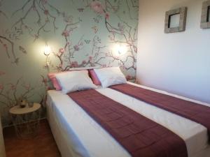Posteľ alebo postele v izbe v ubytovaní Guest House El Angelito de Olivas
