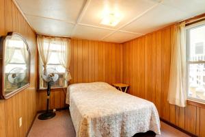 a small bedroom with a bed and a window at Pet-Friendly Vacation Rental in the Salisbury Area in Salisbury