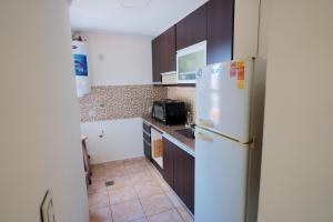 Regia Apartamentos Posadas的厨房或小厨房