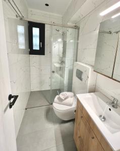 Koupelna v ubytování Trinity Suites