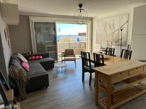 Posezení v ubytování Appartement de l'oursinière 4/6 pers vue mer
