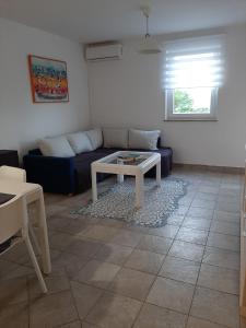 Posezení v ubytování Cosy, sea view apartment Porat