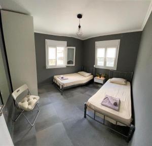 Postel nebo postele na pokoji v ubytování MK Residences