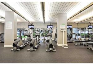 a gym with a bunch of cardio equipment in it at Miami Hollywood Gorgeous 2BD Awesome Ocean View in Hollywood