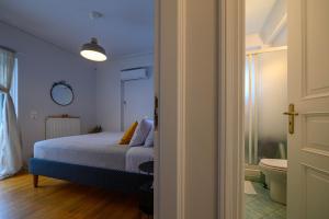 Krevet ili kreveti u jedinici u okviru objekta Marine Luxury Apartment Kalamata