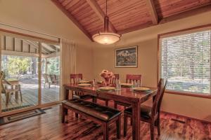 a dining room with a table and chairs at Killdeer - Unit 6 in Sunriver
