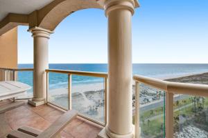 a balcony with a view of the ocean at Portofino Island Resort & Spa 1-1402 in Pensacola Beach