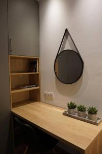 TV a/nebo společenská místnost v ubytování Διαμέρισμα σε πολυκατοικία