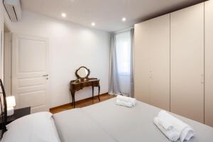 Кровать или кровати в номере Casa mia a Nervi