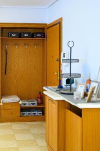 A kitchen or kitchenette at Marine Luxury Apartment Kalamata