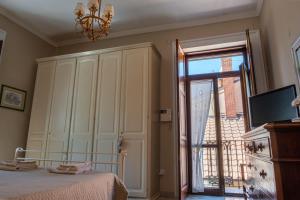 TV a/nebo společenská místnost v ubytování A Casa di Giusy B&B