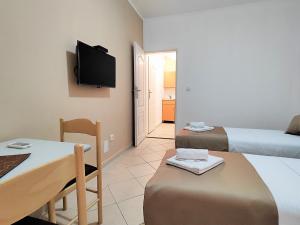 Postel nebo postele na pokoji v ubytování Villa Hera