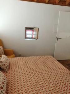 Postel nebo postele na pokoji v ubytování Ti Chôa - Casa da Mata