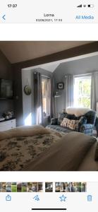 a picture of a bedroom with a bed and a window at Buccleuch Garden Room in Fort William