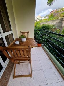Balkón nebo terasa v ubytování One bedroom apartement with city view enclosed garden and wifi at Funchal 4 km away from the beach