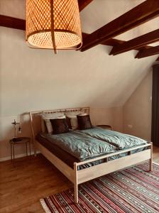 מיטה או מיטות בחדר ב-Hillside Nagymaros
