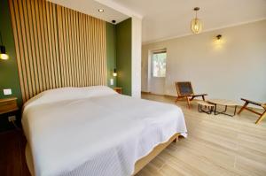 Postel nebo postele na pokoji v ubytování V&V LLORET- Villa Christine + 37 fotografií