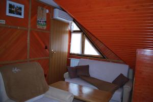 Posezení v ubytování Apartma Mihovc