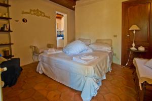 Postel nebo postele na pokoji v ubytování Bed and Breakfast Tenuta Palmieri ONLY ADULT