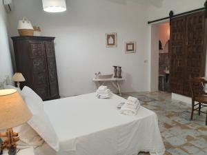 Postel nebo postele na pokoji v ubytování Bed and Breakfast Tenuta Palmieri ONLY ADULT