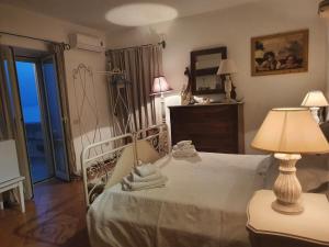 Postel nebo postele na pokoji v ubytování Bed and Breakfast Tenuta Palmieri ONLY ADULT