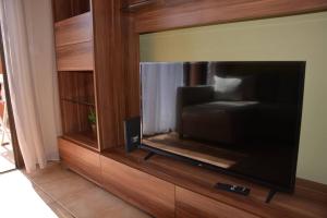 TV a/nebo společenská místnost v ubytování Sonne Wind und Ocean La Tejita