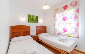 Postel nebo postele na pokoji v ubytování Las Flores Villa Moraira by Nora Nice + 18 fotografií