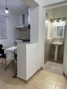 Η κουζίνα ή μικρή κουζίνα στο AMPLIOS Departamentos PASAJE TUCUMÁN +8 φωτογραφίες