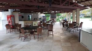 Restaurace v ubytování Paraíso das Dunas - Apartamento à beira mar com jacuzzi - Próximo ao Beach Park