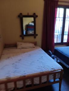 Katil atau katil-katil dalam bilik di Casa quinta LA ESPERADA