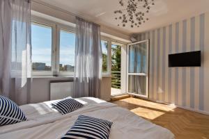 Postel nebo postele na pokoji v ubytování Sopot Holiday Rooms